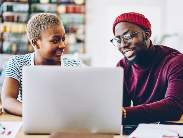 Couple using devices